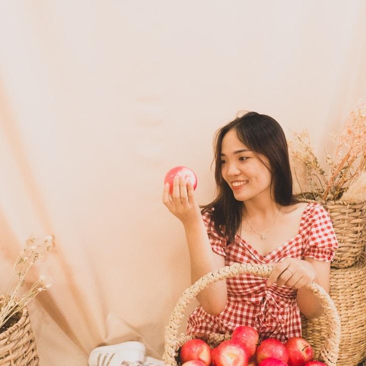 Kaveri Mehta, Lead Design Curator at Meadow Canvas View, reviewing corporate floral arrangements